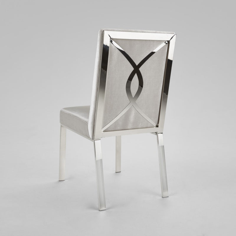 4. "Grey Velvet Dining Chair - Enhance your dining experience with the Emiliano collection"