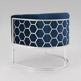 7. "Versatile honeycomb chair in soft blue velvet upholstery"