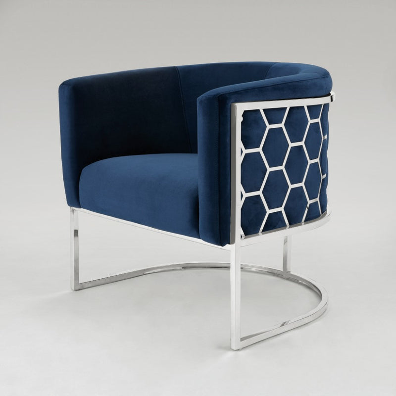 9. "Blue velvet honeycomb chair with sturdy construction and sleek design"