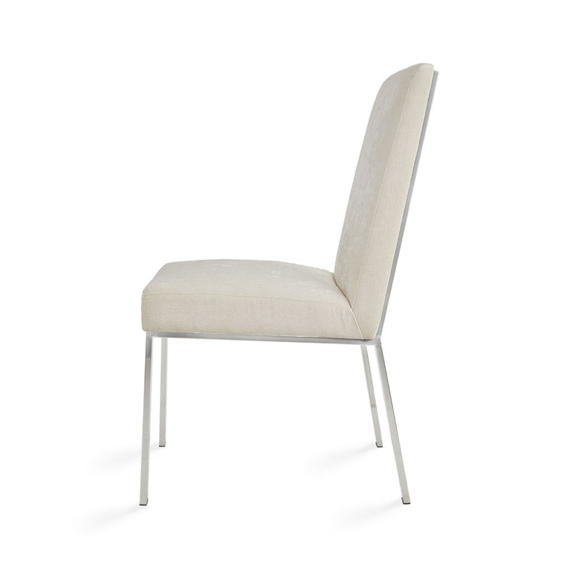 6. "Ivory Fabric Emiliano Dining Chair - Elevate your dining area with this timeless and luxurious seating choice"