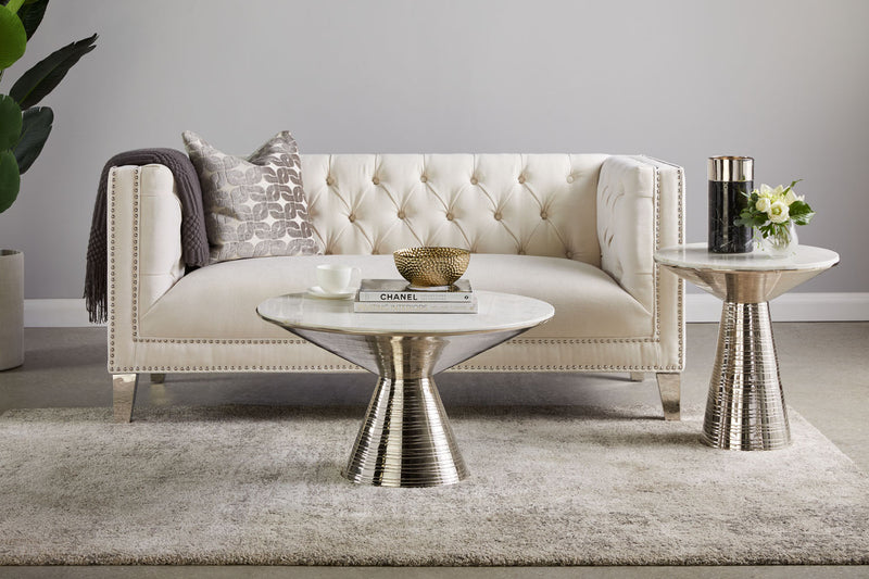 5. "Elevate your Valentine's Day ambiance with a white marble coffee table: Silver frame adds a touch of glamour"
