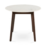 4. "Stylish image of Erin Round Dining Table - Enhance your dining area with its modern design"