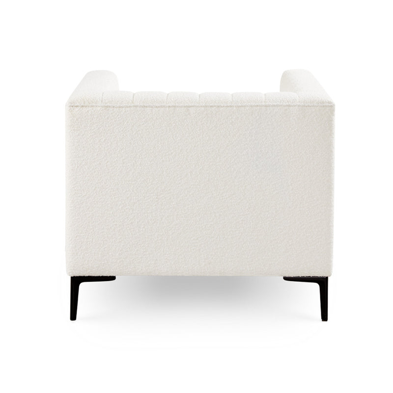 8. "Florian Accent Chair: Boucle Ivory with Black Legs - Create a cozy reading nook or conversation corner"