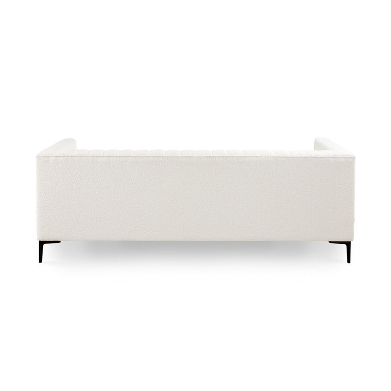 6. "Florian Sofa: Boucle Ivory with Black Legs - Versatile and timeless addition to your home decor"