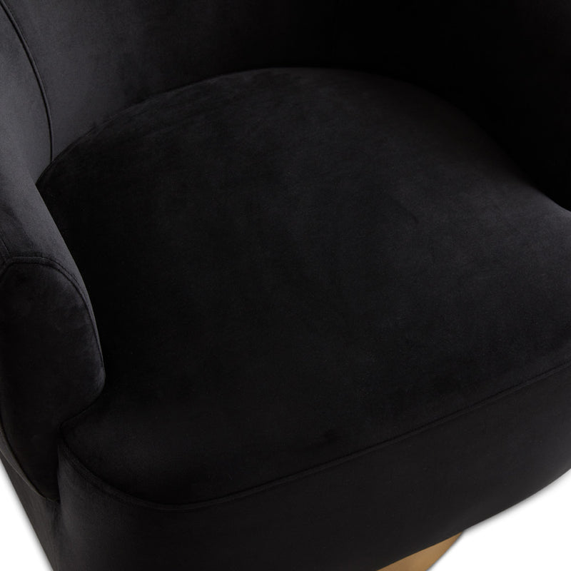 4. "Black Velvet Accent Chair with Swivel Base - Perfect for Modern Interiors"
