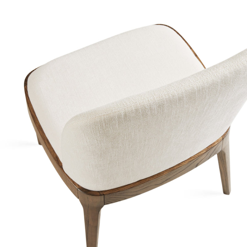 6. "Comfortable ivory dining chair - Enjoy long meals in utmost comfort and style"