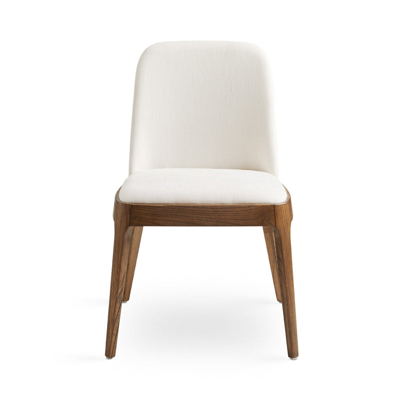 5. "Ivory upholstered dining chair - Add a touch of sophistication to your dining area"