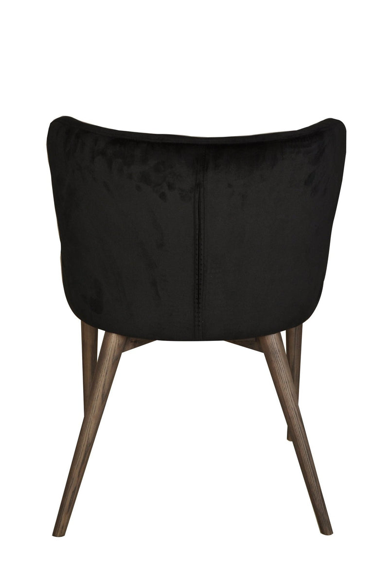 7. "Versatile Mila Dining Chair - Black Velvet suitable for both formal and casual dining settings"