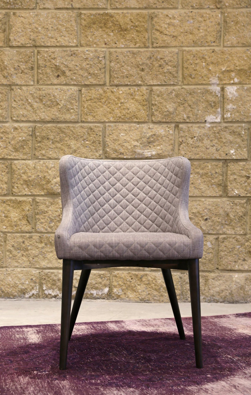 7. "Mila Dining Chair - Light Grey with versatile design suitable for various dining spaces"