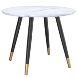 1. "Emery Round Dining Table in White and Black - Sleek and modern design"
