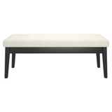 3. "Comfortable cream and black bench for outdoor spaces"