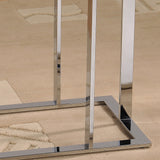 4. "Elegant chrome and black accent table with tempered glass top"