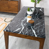 10. "Chic Allure Dining Table featuring a tempered glass top for easy cleaning"
