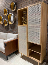 9. "Functional and elegant natural cane bookcase"