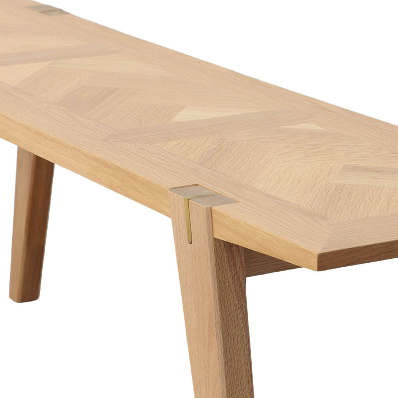 5. "Brass-accented Colton Bench - a chic and comfortable choice for dining rooms"