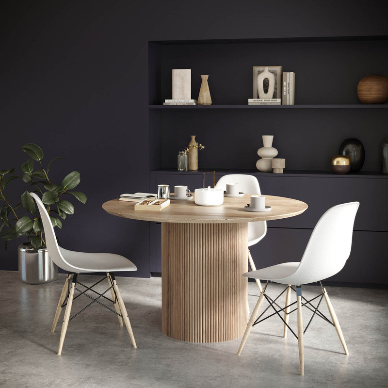 9. "Sophisticated Cylinder Round Dining Table for upscale dining experiences"