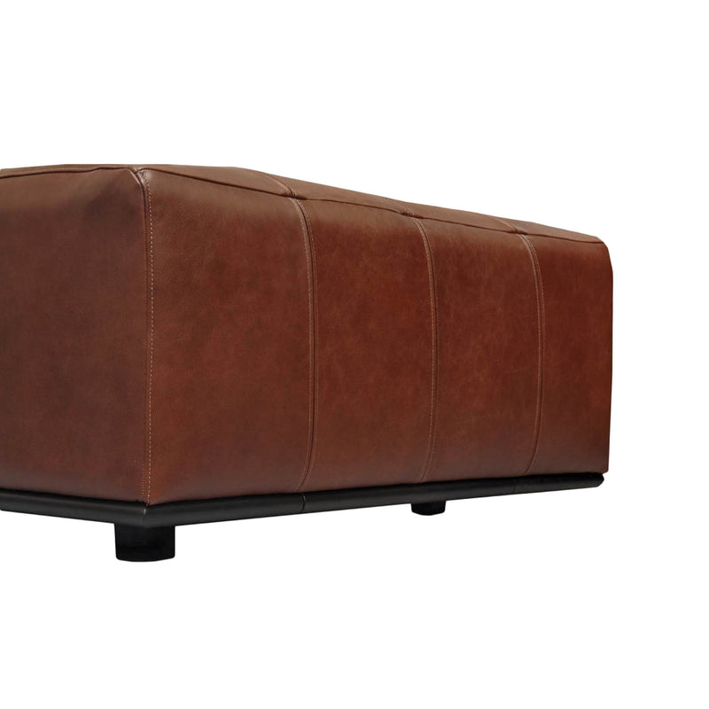 4. Tobacco-colored Sullivan Ottoman - perfect addition to any living room or lounge area