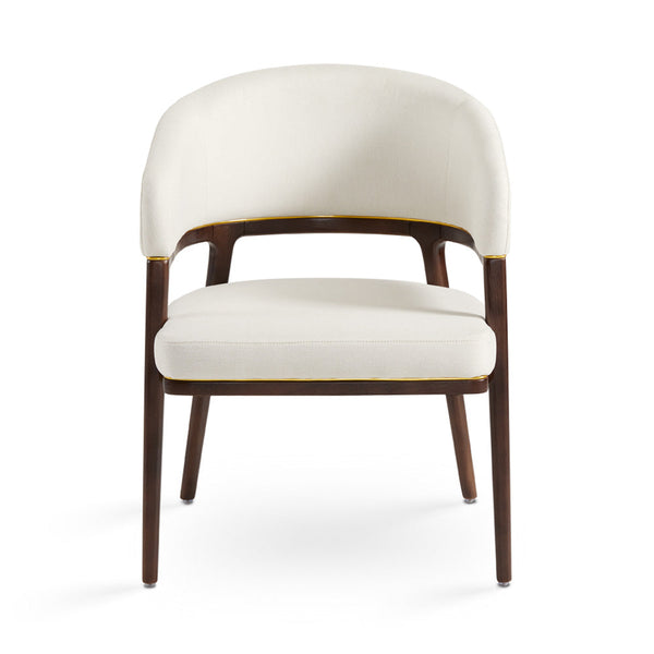 A fresh take on the traditional accent chair with soft ivory linen upholstered curves, Ash wood legs with walnut finish and  Polished gold trim