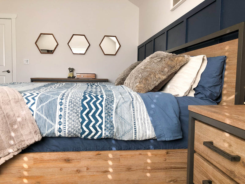 8. "Medium-sized picture of Irondale Queen Bed highlighting its intricate detailing"