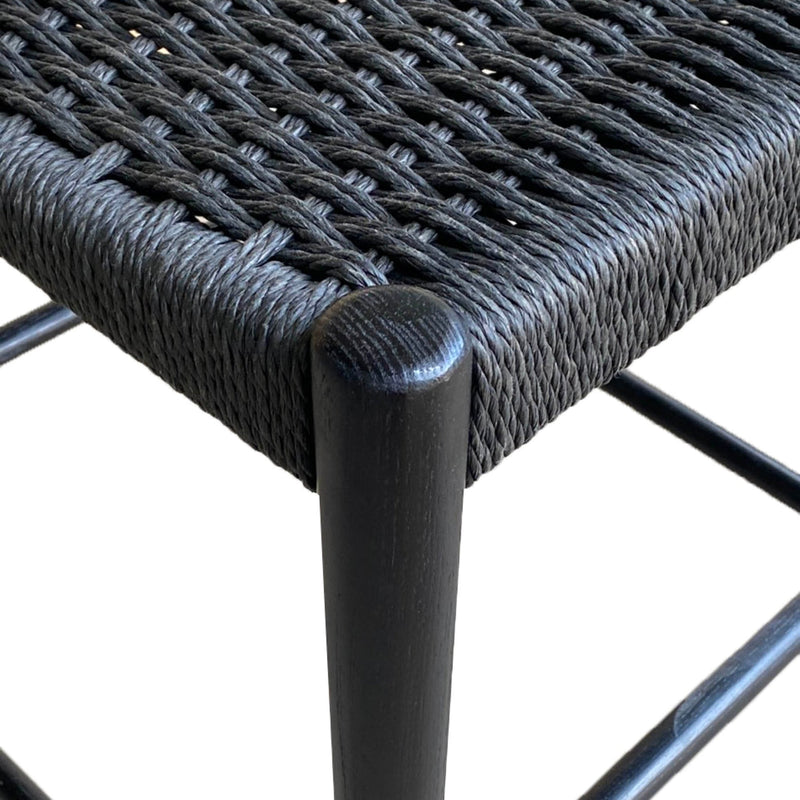 5. "Black/Black Woven Seat Jakarta Dining Chair - Perfect blend of modern and traditional"