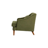 3. "Green Velvet Missy Club Chair featuring a plush and inviting seat"