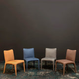 12. Milan Dining Chair in Indigo - Medium-sized seating option for a cozy and inviting dining space