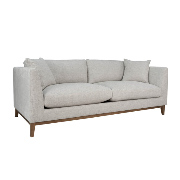 1. "Harmony Sofa - Woven Tweed Neutral in a cozy living room setting"