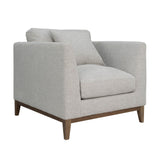 1. "Harmony Club Chair - Woven Tweed Neutral in a cozy living room setting"