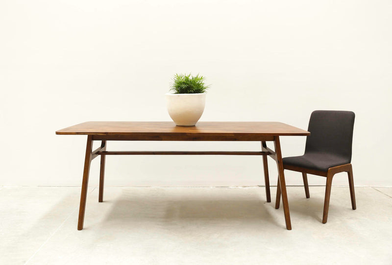 10. "Medium-sized Remix Dining Table - Space-saving design for smaller apartments"