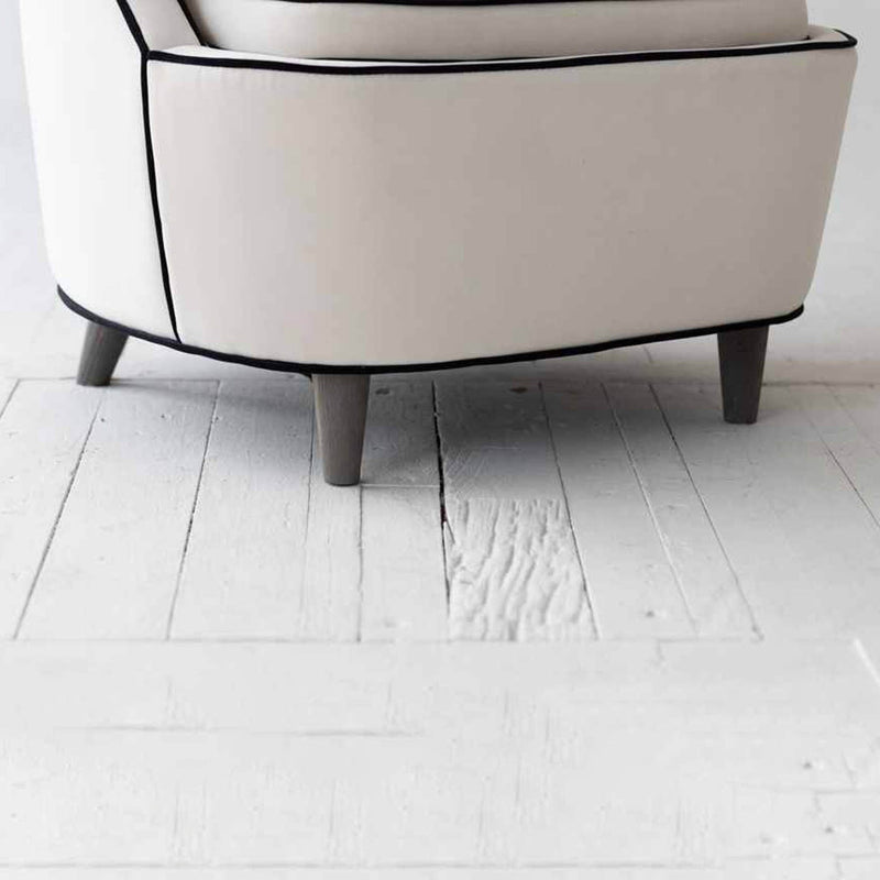 6. "Ebony Club Chair - Ivory with durable construction"