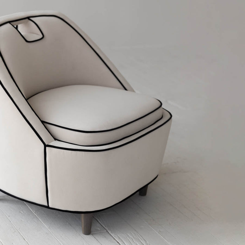 8. "Elegant Ivory Club Chair for sophisticated lounging"