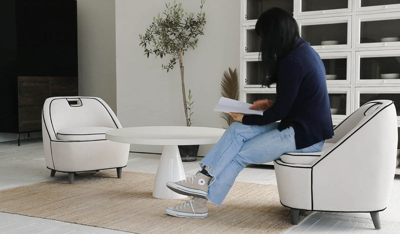 11. "Ebony Club Chair - Ivory with ergonomic design for maximum comfort"