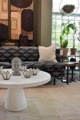 12. "Unique Sculpture Coffee Table for Conversation Starter in Any Room"