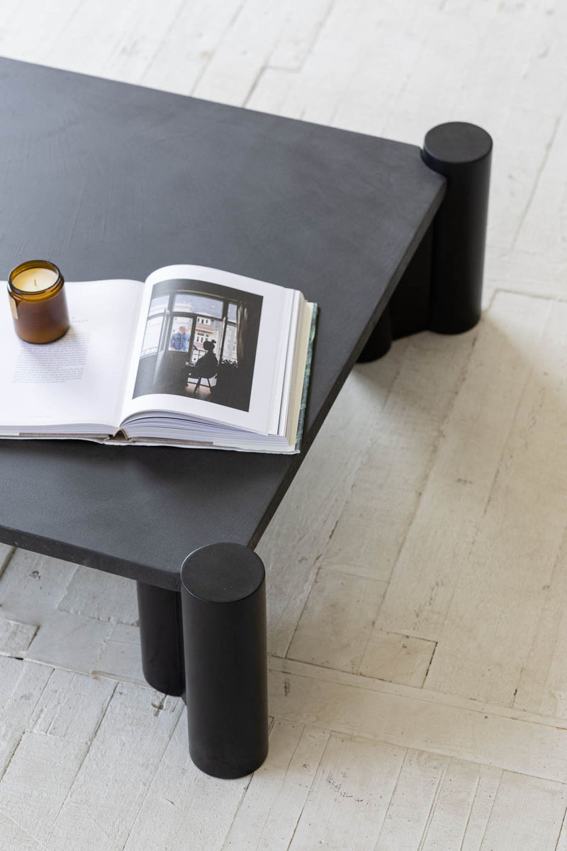 7. "Sophisticated Vito Coffee Table featuring a unique blend of wood and metal accents"