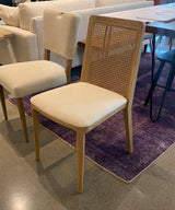 6. Cane dining chair in oyster linen for a sophisticated look