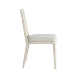 3. "Comfortable cane dining chair with beige/white wash frame - ideal for long meals"