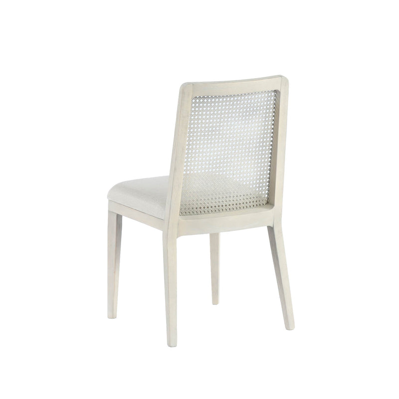 5. "Cane dining chair with beige/white wash frame - adds a touch of sophistication to any dining space"