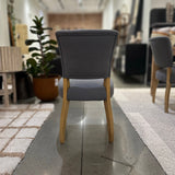 3. "Luther Dining Chair - Stormy Grey/Natural Legs: Modern design with a touch of elegance"