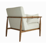 4. "Cloud Boucle Clarita Club Chair with a modern silhouette and cozy feel"
