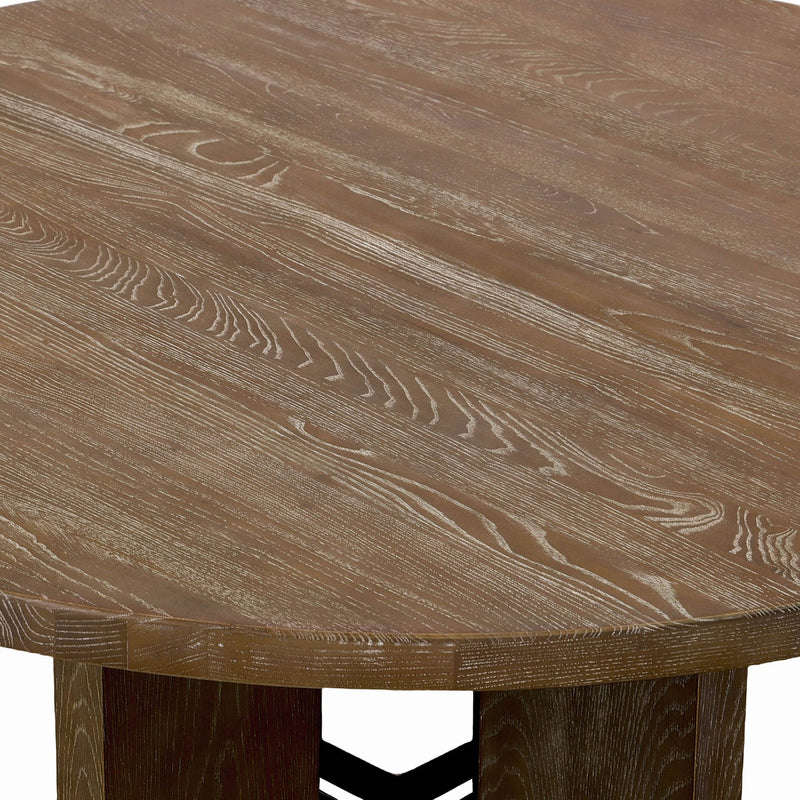 6. "Fraser Round Dining Table - Crafted from high-quality materials for durability"