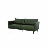 1. "Forest Sofa - Moss Green in a cozy living room setting"