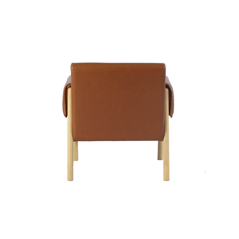 5. "Forest Club Chair - Saddle: Relax in style with this classic leather armchair"