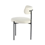 3. "Cleo Dining Chair in Macadamia Travertine: Enhance your dining experience with this luxurious seating"