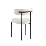 4. "Macadamia Travertine Cleo Chair: A perfect blend of style and functionality for your dining area"