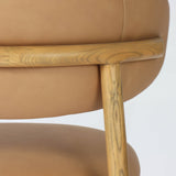 6. "Stylish and sophisticated Tan Leather Milo Dining Chair for luxurious dining experiences"