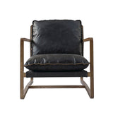 2. "Black Leather Club Chair: Stylish and Relaxing Addition to Any Space"
