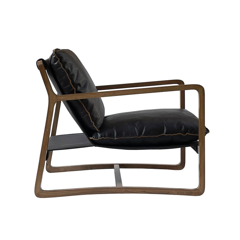 4. "Relax Club Chair in Black Leather: Perfect for Lounging and Unwinding"