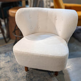 11. "Chic Mellow Club Chair to enhance your home decor"