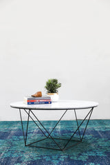 3. Grey Marble/Black Matte Valencia Round Coffee Table - a perfect blend of elegance and functionality