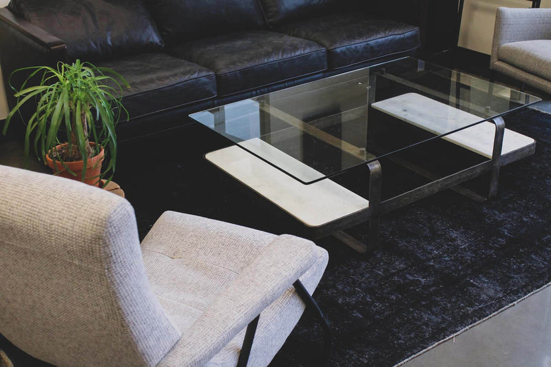 9. "Translucent coffee table with LED lighting for a futuristic touch"